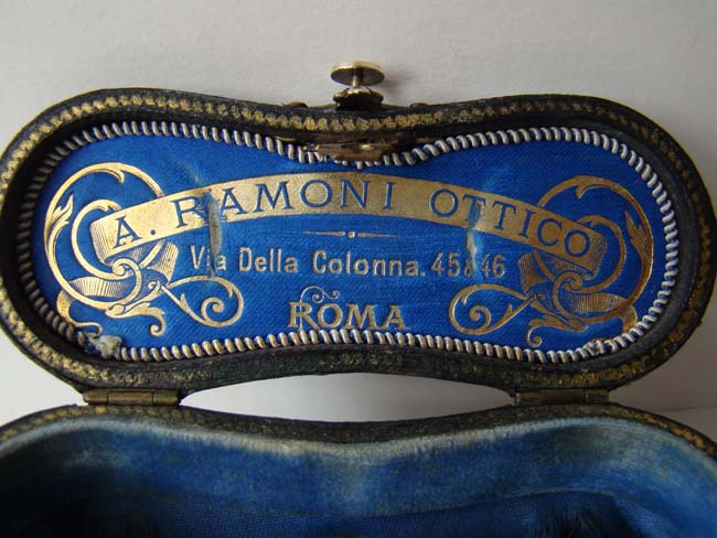 A pair of Italian ivory opera glasses with their original satin lined black leather case made by A. Ramoni, Opticians, of Rome circa 1900. — image 2